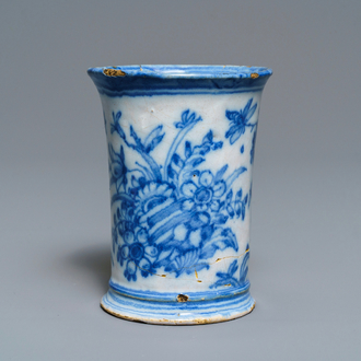 An extremely rare inscribed Dutch Delft blue and white beaker after a silver example, dated 1676