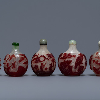 Five Chinese red overlay snowflake glass snuff bottles, 18/20th C.