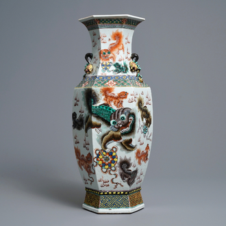 A Chinese hexagonal famille rose 'Buddhist lions and peacocks' vase, 19th C.