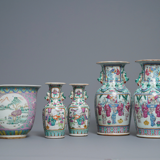 Two pairs of Chinese famille rose vases and a jardinière, 19th C.