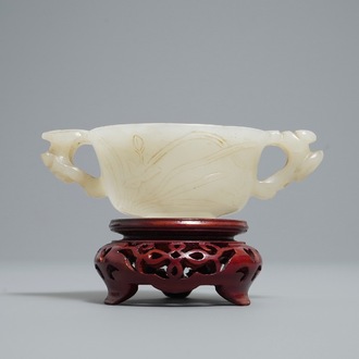 A Chinese pale celadon jade libation cup, 18/19th C.