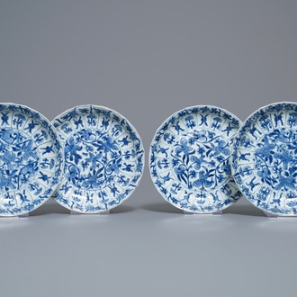 Four Chinese blue and white lotus-moulded plates with floral design, Kangxi