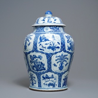 A Chinese blue and white covered vase with floral and landscape panels, Kangxi