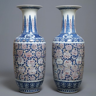 A pair of large Chinese blue, white and underglaze red vases, 19th C.