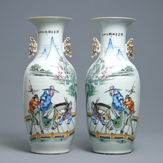 A pair of Chinese famille rose vases with travellers on a donkey, 19/20th C.