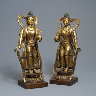 A pair of large Chinese gilt bronze figures, 19th C.