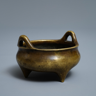 A Chinese bronze tripod censer, Xuande mark, 18/19th C.