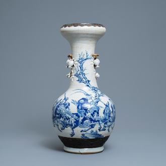 A Chinese blue, white and copper red Nanking crackle-glazed vase, 19th C.