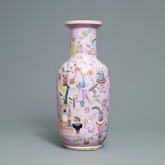 A Chinese famille rose pink-ground rouleau vase, 19th C.