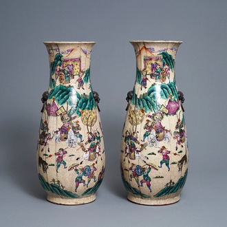 A pair of Chinese Nanking famille rose vases with warriors, 19th C.