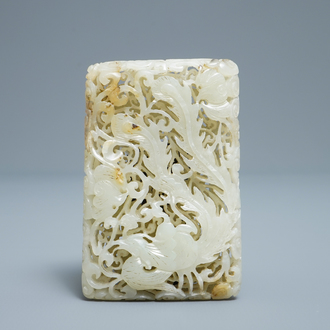 A Chinese reticulated pale celadon jade 'dragon and phoenix' carving, Ming