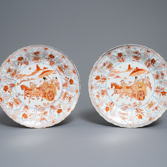 A pair of Chinese 'milk and blood' plates with a horse carriage, Kangxi