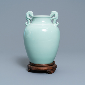 A Chinese monochrome dragon-handled celadon vase, Qianlong mark, 19/20th C.