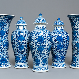 A Chinese blue and white five-piece garniture with floral design, Kangxi