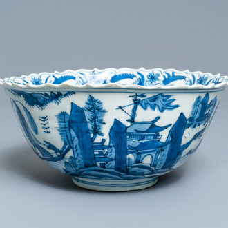 Un bol en porcelaine de Chine en bleu et blanc à décor d'un paysage au pagode, Wanli