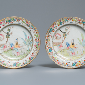 A pair of Chinese famille rose plates with figures in a garden, Yongzheng