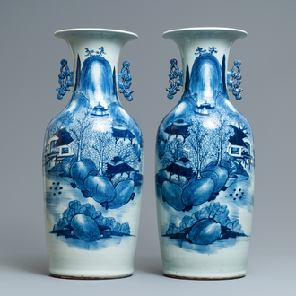 A pair of Chinese blue and white 'landscape' vases, 19th C.