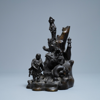 A large Chinese bronze group with Guanyin with child on a rock, Ming