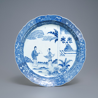 A large Chinese blue and white 'Romance of the Western chamber' dish, Qianlong