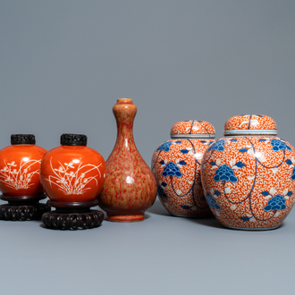 Two pairs of Chinese coral-ground jars and a flambé-glazed bottle vase, 19/20th C.