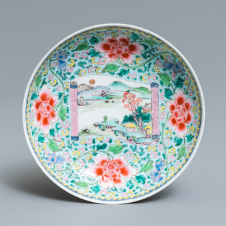 A Chinese famille rose saucer dish with a landscape, Yongzheng mark and of the period