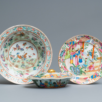 A Chinese Canton famille rose tureen and cover, a plate and a famille rose 'butterfly' bowl, 19th C.