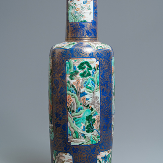 A massive Chinese famille verte on powder blue-ground rouleau vase, Kangxi