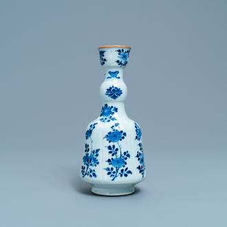 A Chinese blue and white elongated huqqa base with floral design, Kangxi