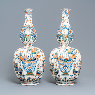 A pair of exceptional large ribbed Dutch Delft cashmere palette vases with flower vases, ca. 1700