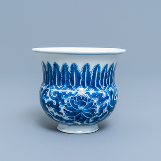 A Chinese blue and white 'lotus scroll' spittoon or zhadou, Kangxi