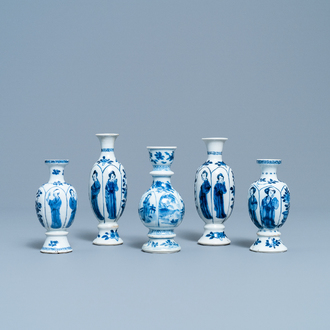 Four Chinese blue and white miniature vases and a huqqa base, Kangxi