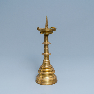 A large Flemish bronze candlestick, 16th C.