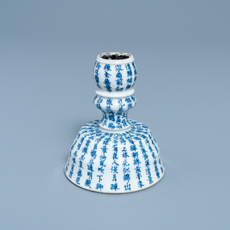 A Chinese blue and white Vietnamese market 'Bleu de Hue' candlestick, 19th C.