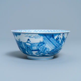 Un bol en porcelaine de Chine en bleu et blanc à décor de figures dans un paysage, marque et époque de Kangxi