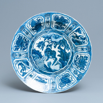 A large Chinese blue and white kraak porcelain dish with a mythical beast, Wanli