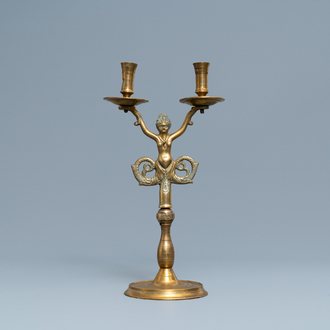 A large bronze candlestick with a siren with dolphin tails, Nuremberg, Germany, 16th C.