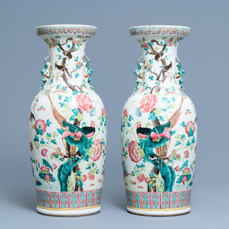 A pair of Chinese famille rose vases with birds among blossoming branches, 19th C.