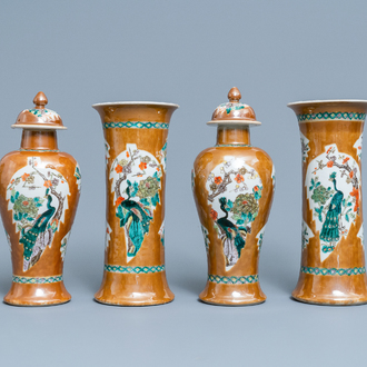 A Chinese famille verte capucin brown-ground four-piece garniture, 19th C.