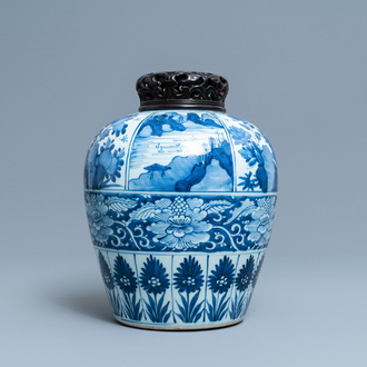 A large Chinese blue and white jar with wooden cover, Kangxi