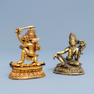 Two Sino-Tibetan gilt bronze figures, 19th C.