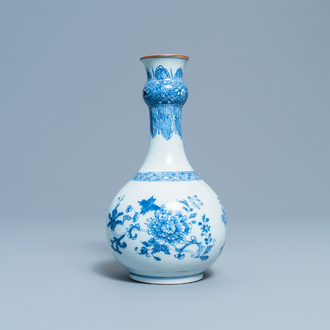 A Chinese blue and white bottle vase with floral design, Yongzheng/Qianlong