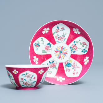 A Chinese famille rose ruby-ground cup and saucer, Yongzheng