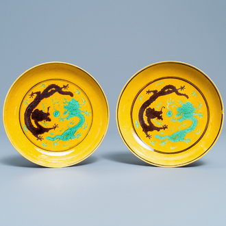 A pair of Chinese yellow-ground green and aubergine 'dragon' dishes, Tongzhi mark and of the period