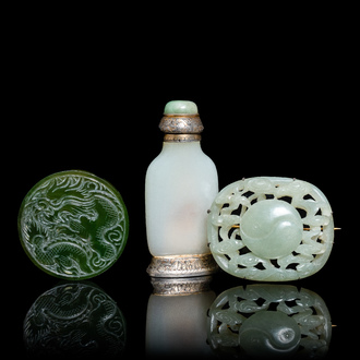 A Chinese white jade snuff bottle and two green jade carvings, 17th C. and later