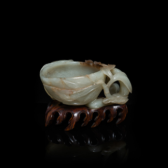 A Chinese mottled celadon and brown jade peach-form brush washer, Qing