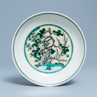 A Chinese verte biscuit 'Three friends of winter' dish, Jiajing mark, 18/19th C.