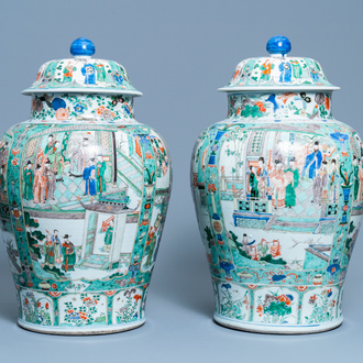 A pair of large Chinese famille verte vases and covers, Kangxi