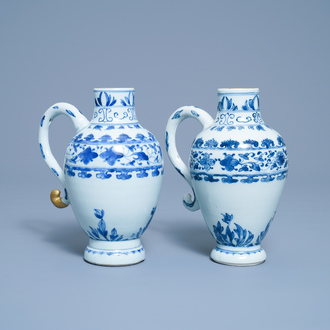 A pair of Chinese blue and white ewers, Transitional period