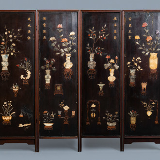 A Chinese lacquered wooden screen embellished with bone, wood and various stones, 18/19th C.