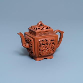 A Chinese reticulated Yixing stoneware teapot and cover, Kangxi